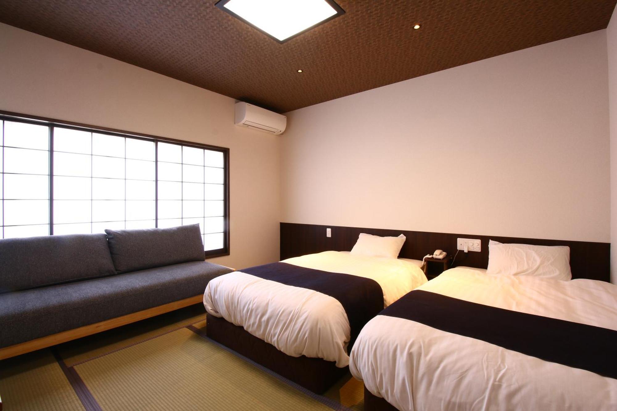 איזומו Masuya Ryokan חדר תמונה
